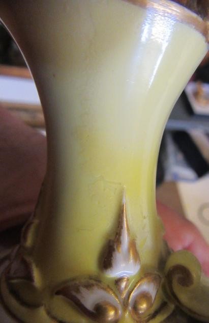 A PAIR OF ROYAL WORCESTER HADLEY WARE EWERS Image