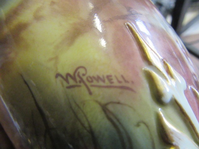 A PAIR OF ROYAL WORCESTER HADLEY WARE EWERS Image