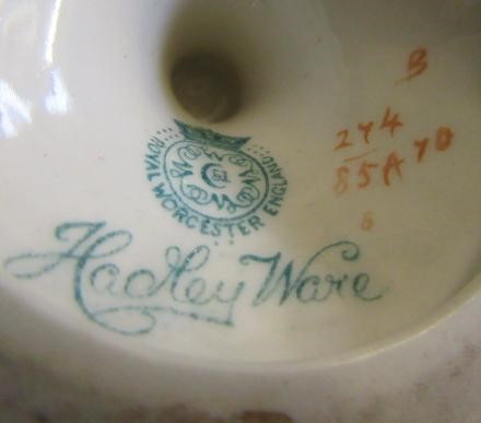 A PAIR OF ROYAL WORCESTER HADLEY WARE EWERS Image