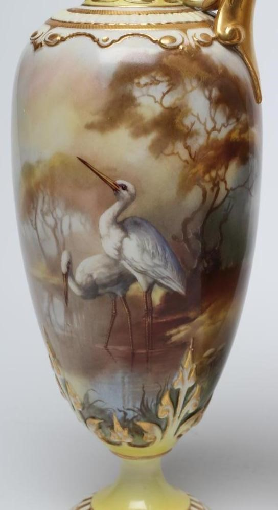 A PAIR OF ROYAL WORCESTER HADLEY WARE EWERS Image