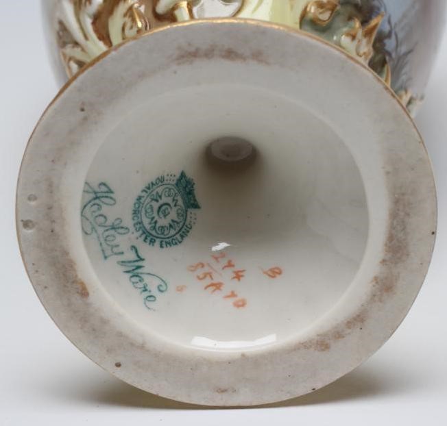 A PAIR OF ROYAL WORCESTER HADLEY WARE EWERS Image