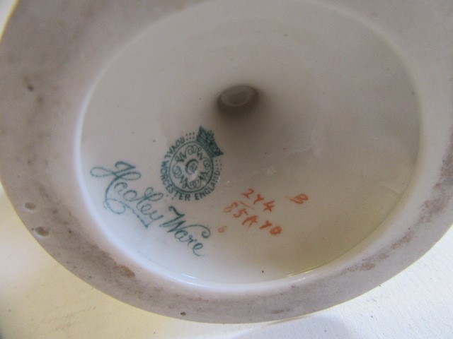 A PAIR OF ROYAL WORCESTER HADLEY WARE EWERS Image