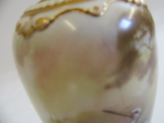 A PAIR OF ROYAL WORCESTER HADLEY WARE EWERS Image