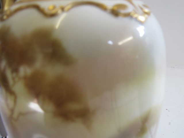 A PAIR OF ROYAL WORCESTER HADLEY WARE EWERS Image