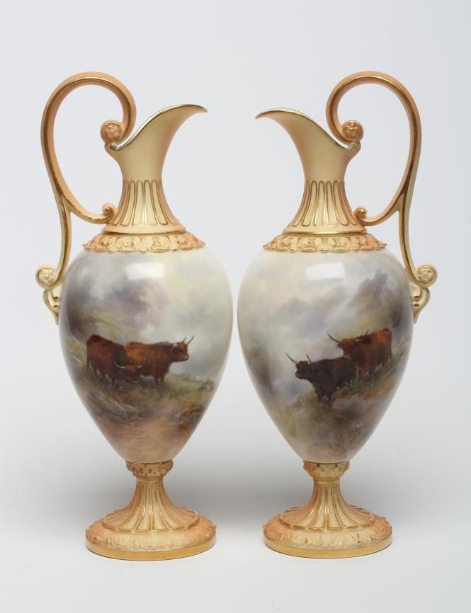 A PAIR OF ROYAL WORCESTER EWERS Image