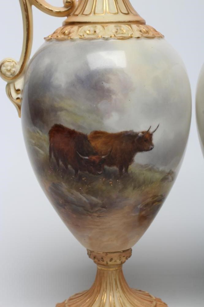 A PAIR OF ROYAL WORCESTER EWERS Image