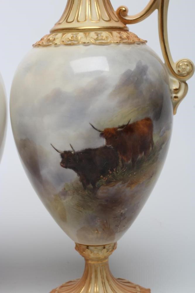A PAIR OF ROYAL WORCESTER EWERS Image