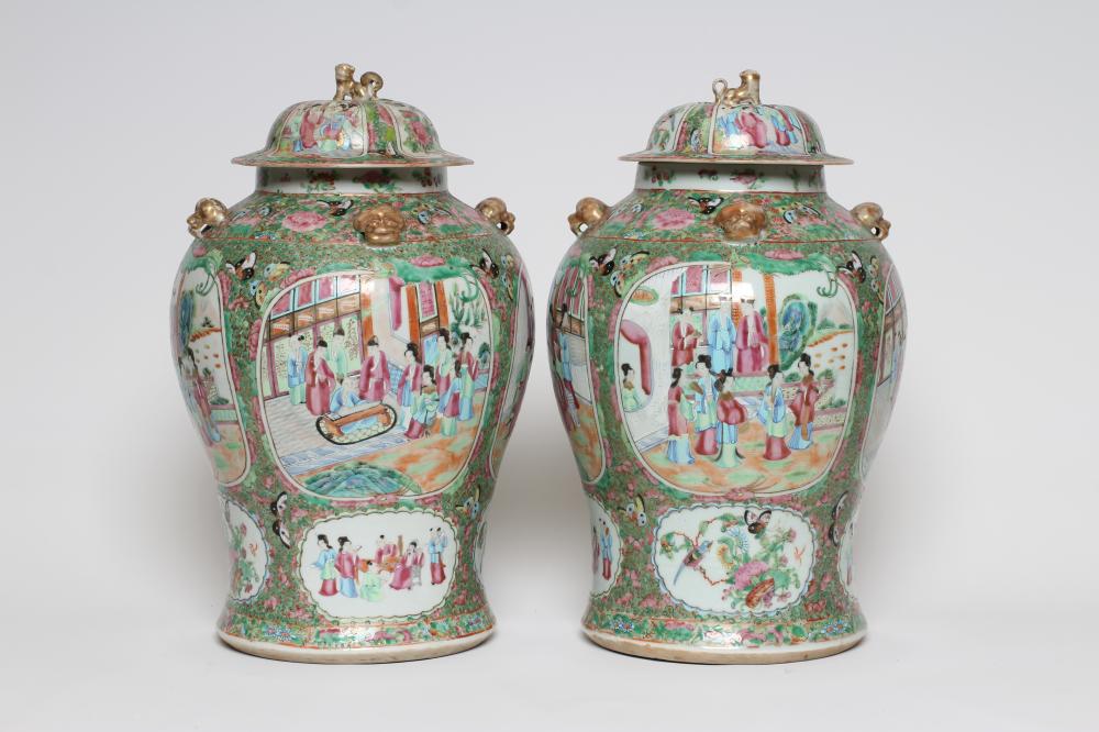 A PAIR OF CHINESE PORCELAIN JARS AND COVERS of inverted baluster form each with four pierced mask Image