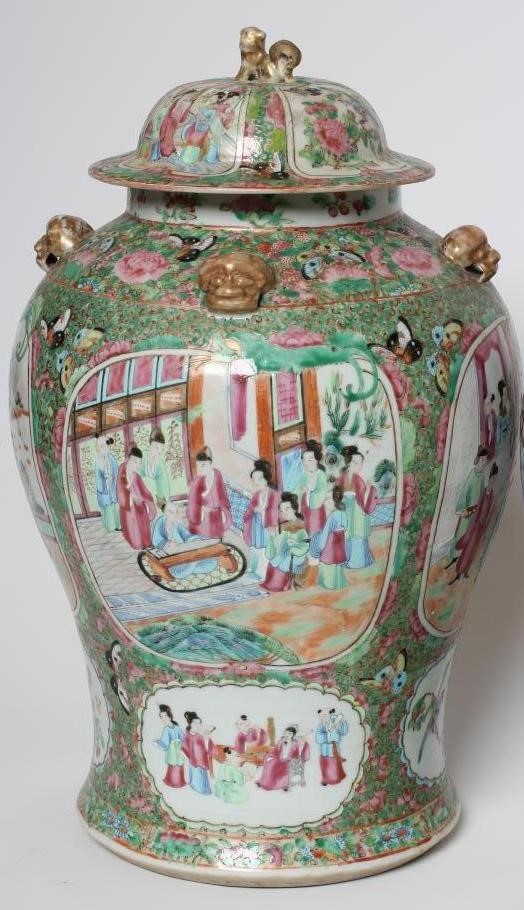 A PAIR OF CHINESE PORCELAIN JARS AND COVERS of inverted baluster form each with four pierced mask Image