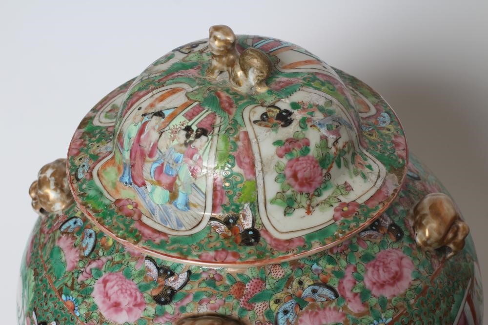 A PAIR OF CHINESE PORCELAIN JARS AND COVERS of inverted baluster form each with four pierced mask Image