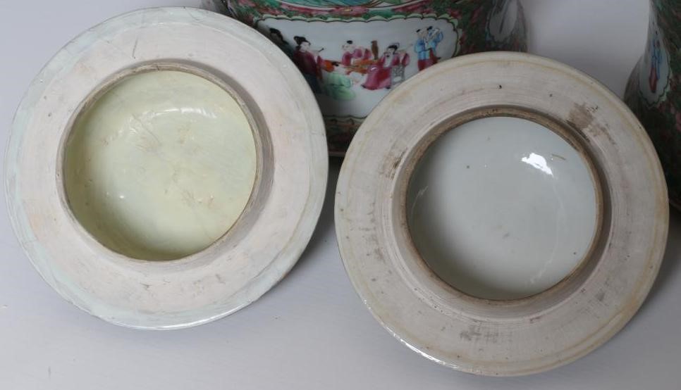 A PAIR OF CHINESE PORCELAIN JARS AND COVERS of inverted baluster form each with four pierced mask Image