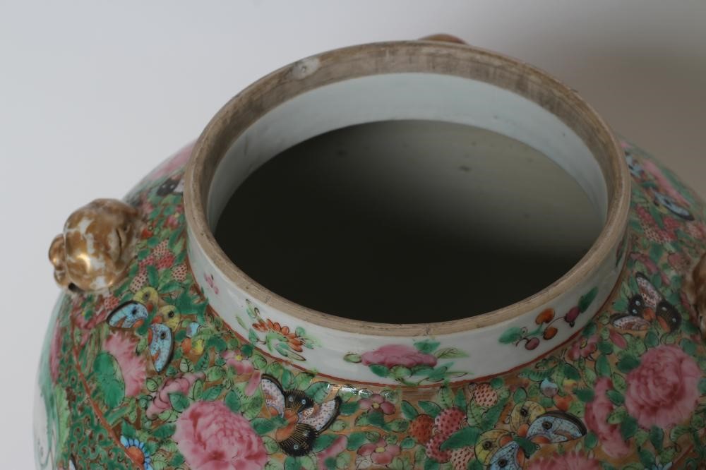 A PAIR OF CHINESE PORCELAIN JARS AND COVERS of inverted baluster form each with four pierced mask Image