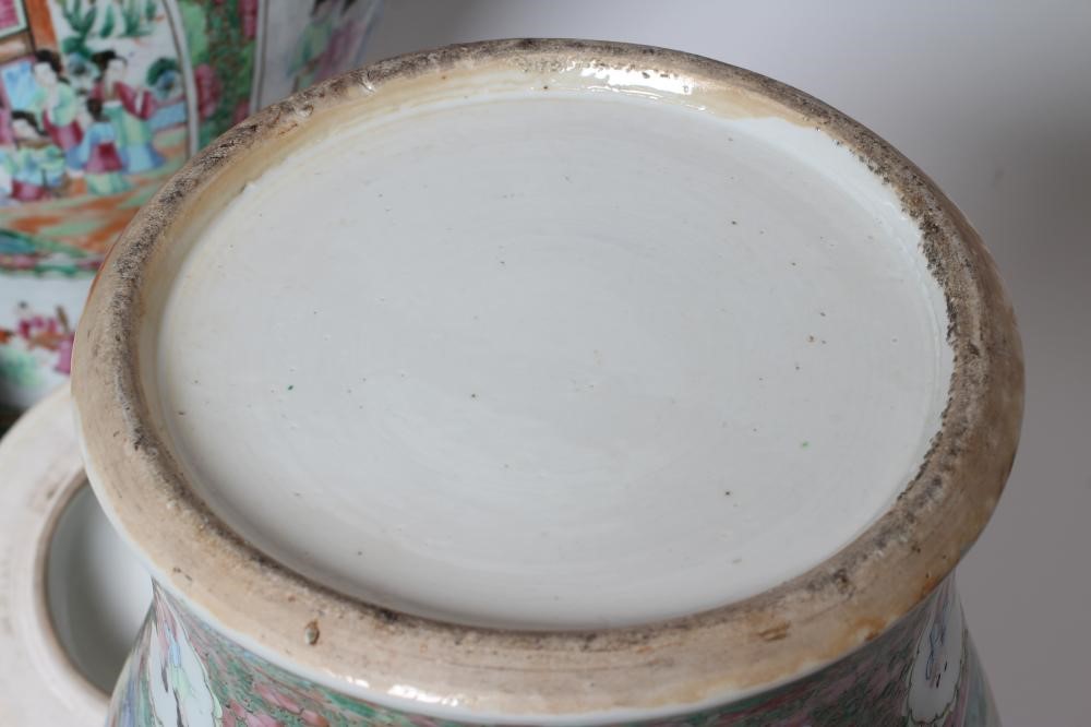 A PAIR OF CHINESE PORCELAIN JARS AND COVERS of inverted baluster form each with four pierced mask Image