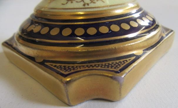 A PAIR OF COALPORT CHINA VASES AND COVERS of ovoid pedestal form Image