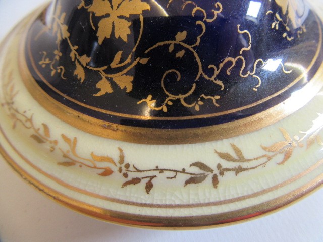 A PAIR OF COALPORT CHINA VASES AND COVERS of ovoid pedestal form Image