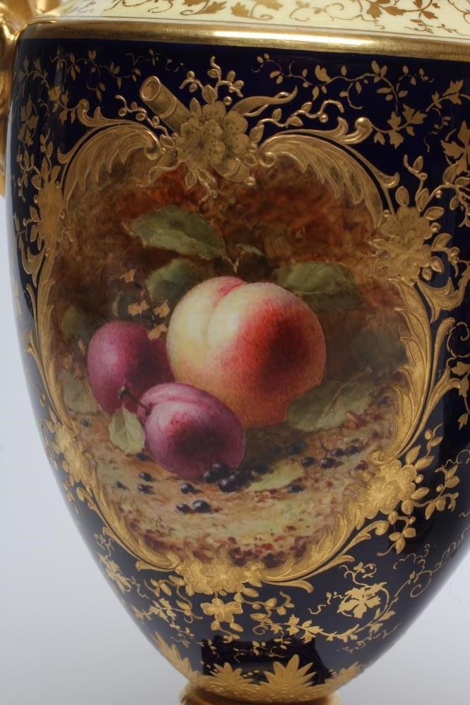 A PAIR OF COALPORT CHINA VASES AND COVERS of ovoid pedestal form Image