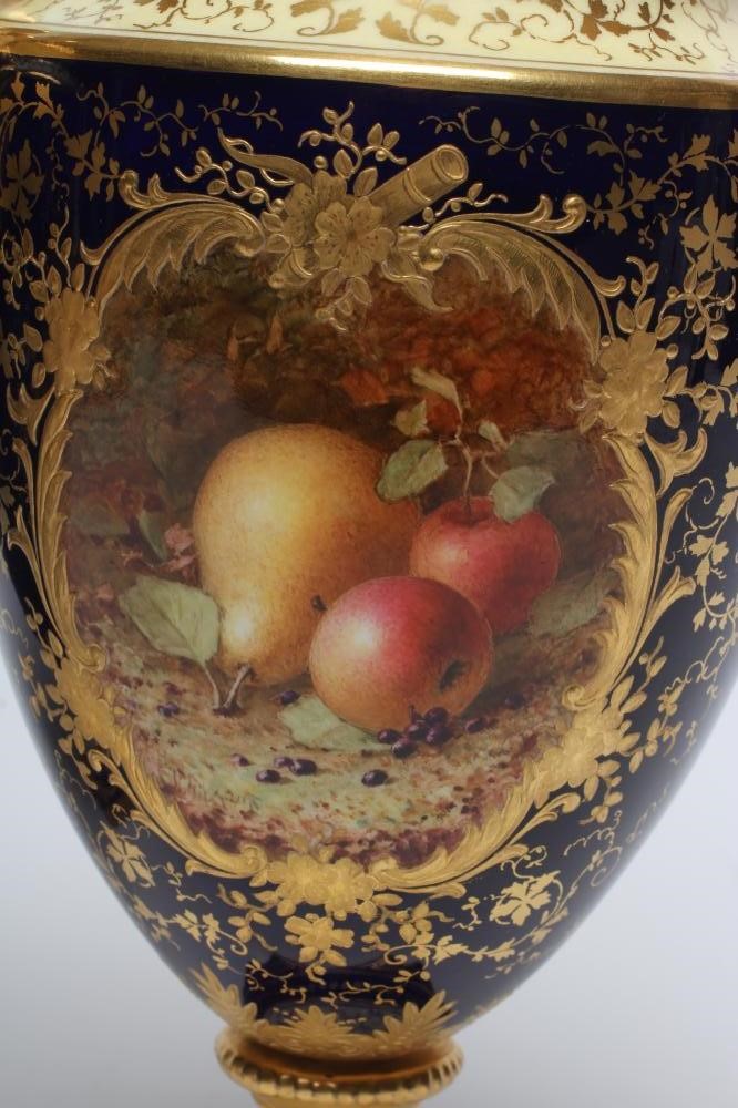 A PAIR OF COALPORT CHINA VASES AND COVERS of ovoid pedestal form Image