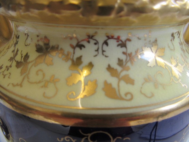 A PAIR OF COALPORT CHINA VASES AND COVERS of ovoid pedestal form Image