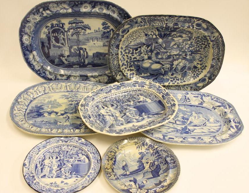 A COLLECTION OF FOUR BLUE AND WHITE PRINTED EARTHENWARE MEAT PLATES comprising "The Philosopher" Image