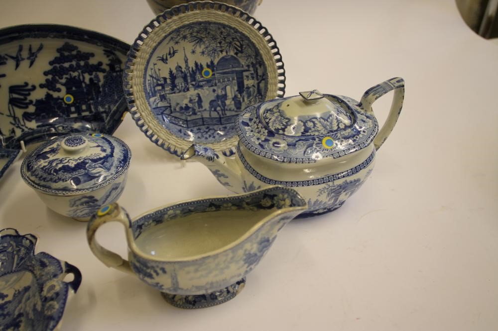 A QUANTITY OF BLUE AND WHITE PRINTED EARTHENWARE ITEMS including a "Piccolo Bent" dessert dish Image