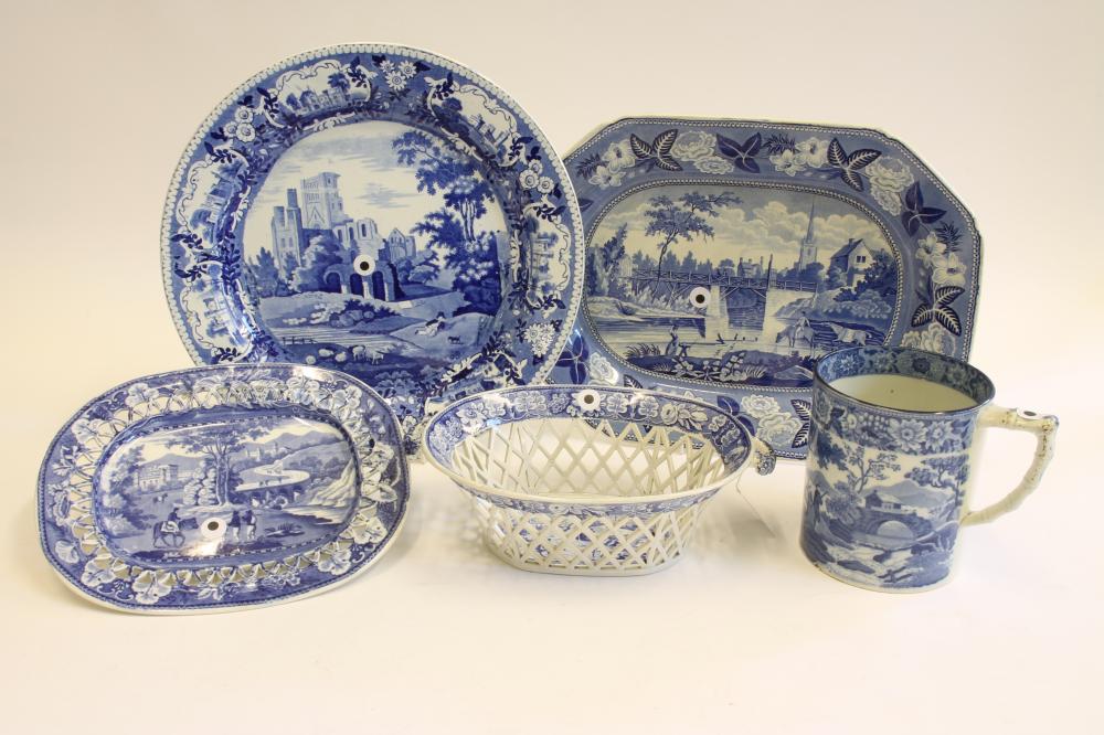 A COLLECTION OF FIVE BLUE AND WHITE PRINTED EARTHENWARE MUGS Image