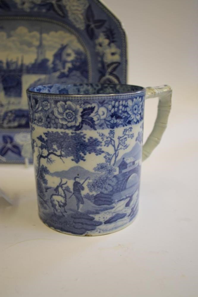 A COLLECTION OF FIVE BLUE AND WHITE PRINTED EARTHENWARE MUGS Image