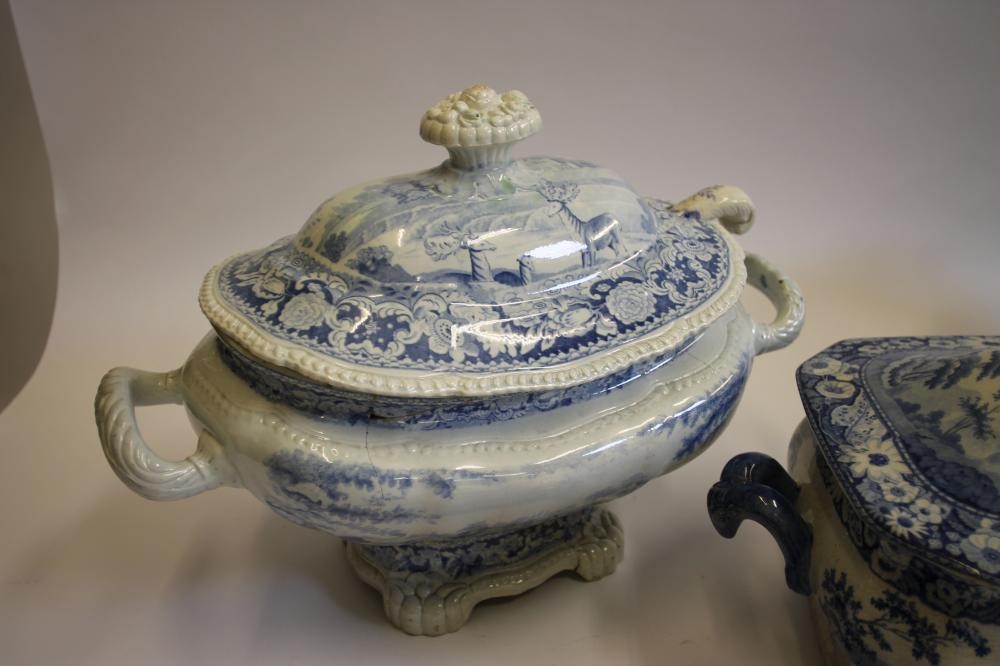 A QUANTITY OF BLUE AND WHITE PRINTED EARTHENWARE including a "Village Fisherman" tureen stand Image