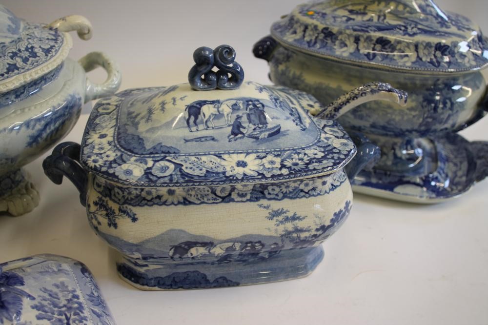 A QUANTITY OF BLUE AND WHITE PRINTED EARTHENWARE including a "Village Fisherman" tureen stand Image