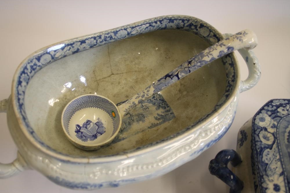 A QUANTITY OF BLUE AND WHITE PRINTED EARTHENWARE including a "Village Fisherman" tureen stand Image