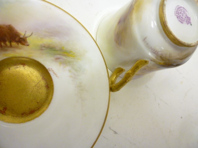 A ROYAL WORCESTER PORCELAIN CABINET CUP AND SAUCER Image