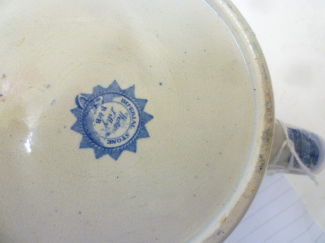 A BLUE AND WHITE PRINTED EARTHENWARE SPITTOON Image
