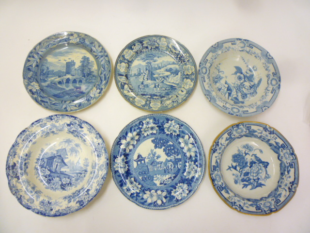 A COLLECTION OF BLUE AND WHITE PRINTED EARTHENWARE PLATES AND SOUP PLATES comprising three Rogers Image