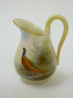 A ROYAL WORCESTER PORCELAIN MINIATURE JUG Image