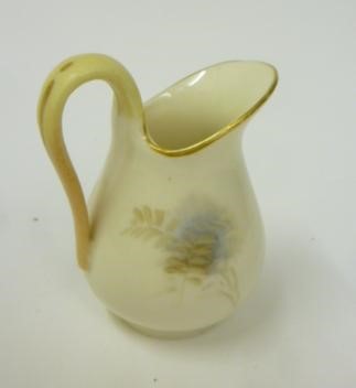 A ROYAL WORCESTER PORCELAIN MINIATURE JUG Image