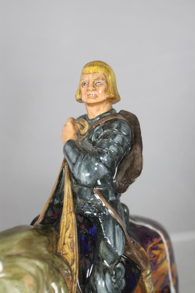 A ROYAL DOULTON EARTHENWARE FIGURE OF ST. GEORGE Image