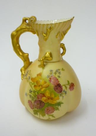 A ROYAL WORCESTER PORCELAIN CORAL TWIG HANDLED JUG Image
