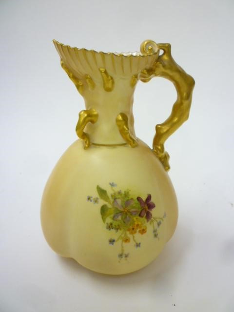 A ROYAL WORCESTER PORCELAIN CORAL TWIG HANDLED JUG Image