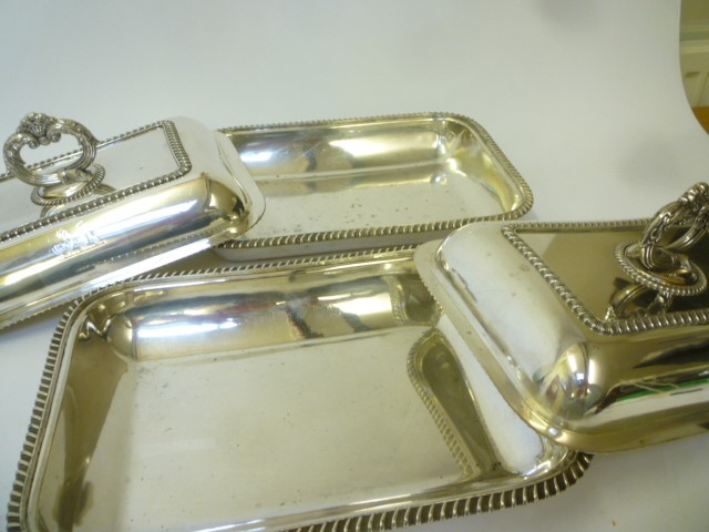 A PAIR OF LATE VICTORIAN PLATED ON COPPER ENTREE DISHES AND COVERS Image