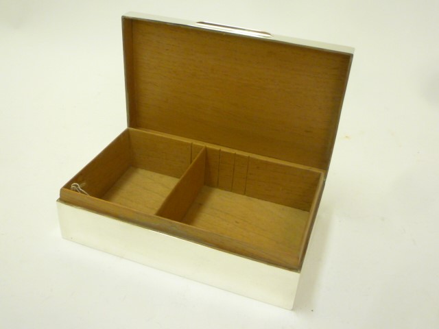 A SILVER CIGAR BOX Image