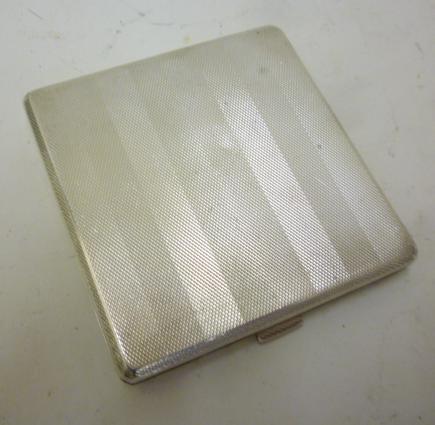 AN ART DECO SILVER CIGARETTE CASE Image