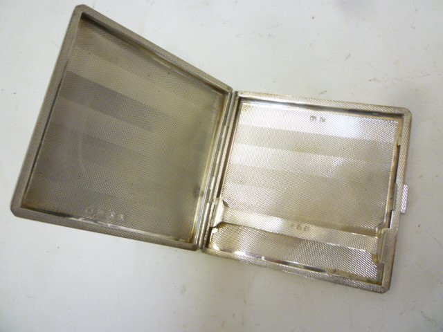 AN ART DECO SILVER CIGARETTE CASE Image
