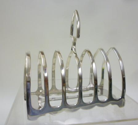 A SILVER SEVEN BAR TOASTRACK Image