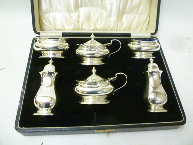 A SILVER SIX PIECE CRUET Image