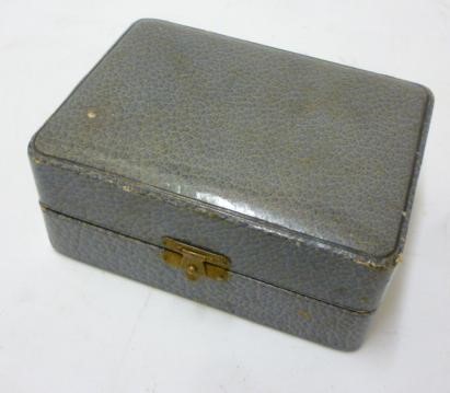 A SET OF FOUR ART DECO SILVER NAPKIN RINGS Image