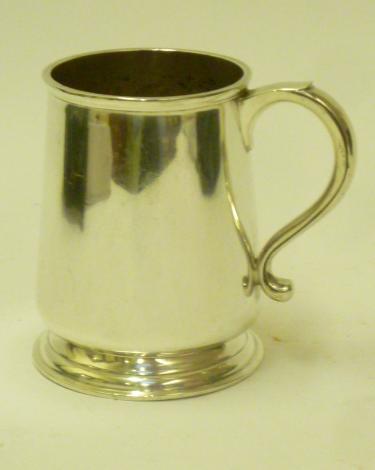 A SILVER MUG Image