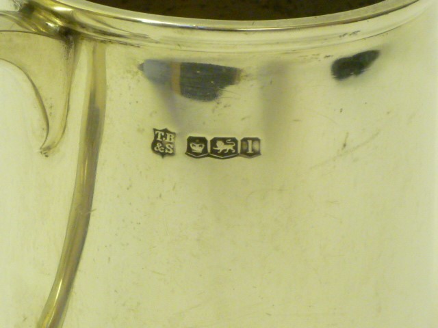 A SILVER MUG Image