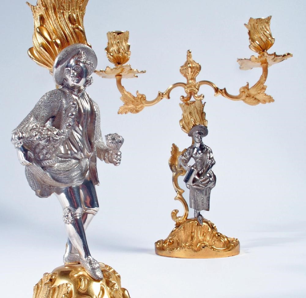 A PAIR OF SILVER  AND PARCEL GILT ROCOCO STYLE FIGURAL TWO BRANCH CANDELABRA Image