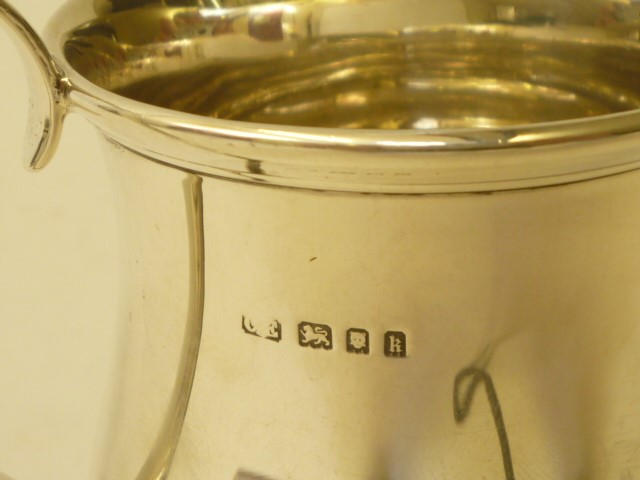 A SILVER MUG Image