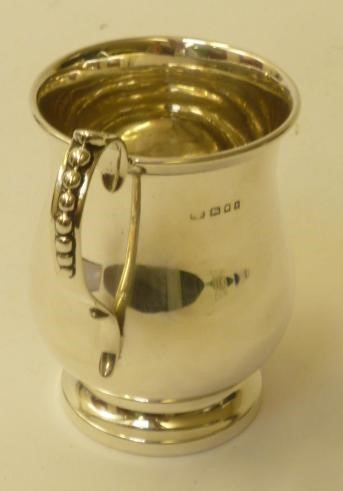 A SILVER MUG Image