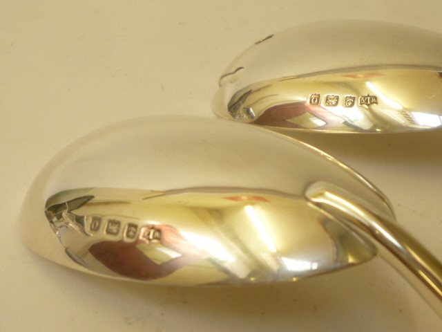 A PAIR OF SILVER SALAD SERVERS Image